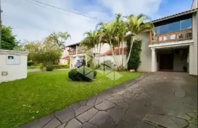 Casa em condomínio fechado com 3 quartos à venda na Avenida Eduardo Prado, 2050, Cavalhada, Porto Alegre