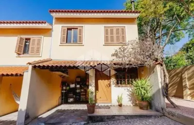 Casa em condomínio fechado com 3 quartos à venda na Rua Humberto de Campos, 601, Partenon, Porto Alegre