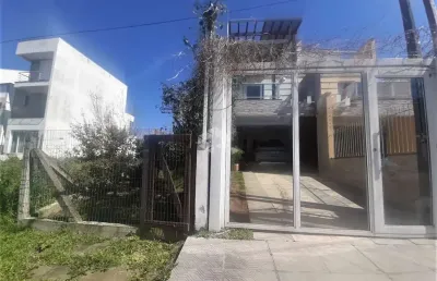 Casa com 3 quartos à venda na Rua Danton Krás Borges, 53, Guarujá, Porto Alegre