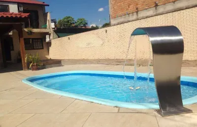 Casa com 3 quartos à venda na Rua Menezes Paredes, 225, Nonoai, Porto Alegre