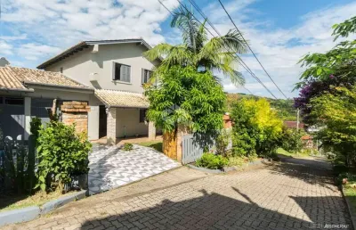 Casa em condomínio fechado com 3 quartos à venda na Estrada João Passuelo, 1060, Vila Nova, Porto Alegre