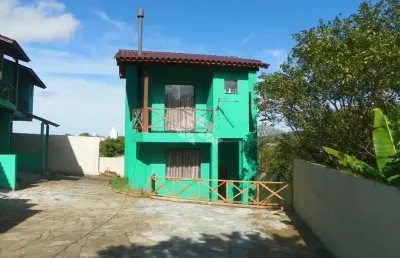 Casa em condomínio fechado com 3 quartos à venda na Avenida Vicente Monteggia, 1669, Cavalhada, Porto Alegre