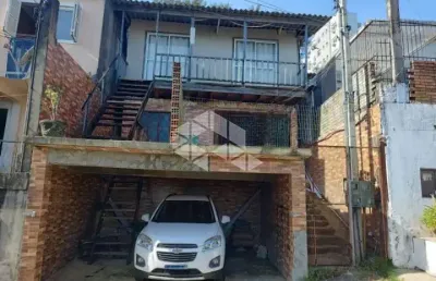 Casa à venda com 3 quartos/dormitórios, 2 vagas no bairro santo antônio em porto alegre.