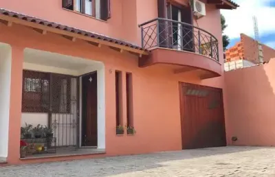 Casa em condomínio fechado com 3 quartos à venda na Rua Oscar Schneider, 83, Medianeira, Porto Alegre