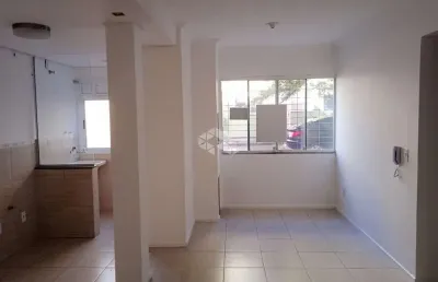 Apartamento com 2 dormitórios e box escriturado no guarujá