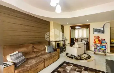 Casa com 3 quartos à venda na Rua Doutor Telmo Vergara, 278, Partenon, Porto Alegre