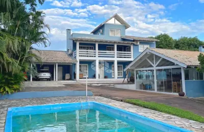 Casa com 6 quartos à venda na Rua Marquês do Maricá, 444, Vila Nova, Porto Alegre