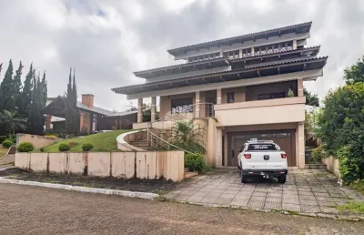 Linda casa de 4 dormitórios e 2 suítes, no condomínio condado de castella/viamão