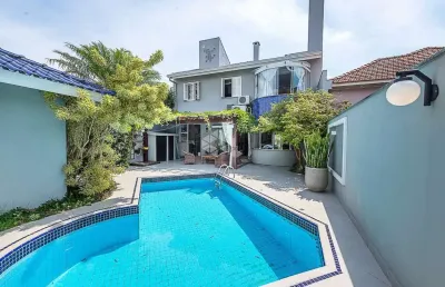 Casa com 4 quartos à venda na Rua Fernando Abbott, 78, Cristo Redentor, Porto Alegre