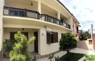 Casa com 3 quartos à venda na Avenida Edu Las Casas, 292, Parque Santa Fé, Porto Alegre