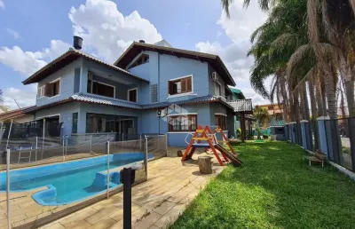 Casa com 4 quartos à venda na Rua Doutor Ladislau Ruttkay, 16, Sarandi, Porto Alegre