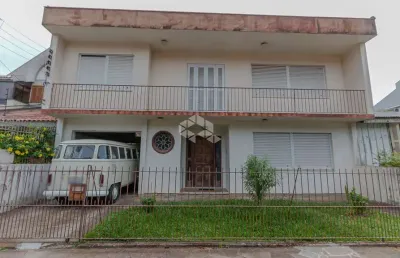Casa com 4 quartos à venda na Rua Doutor Jorge Fayet, 672, Chácara das Pedras, Porto Alegre