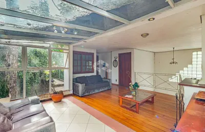 Casa em condomínio fechado com 4 quartos à venda na Rua São Benedito, 192, Jardim do Salso, Porto Alegre