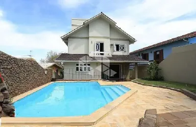 Casa 4 dormitórios, piscina no bairro  primavera em novo hamburgo