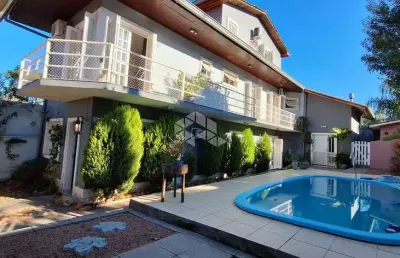 Casa com 4 quartos à venda na Rua José Pedro de Moura, 39, Jardim Isabel, Porto Alegre