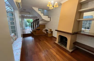 Casa com 3 quartos à venda na Rua Miguel Tostes, 706, Rio Branco, Porto Alegre