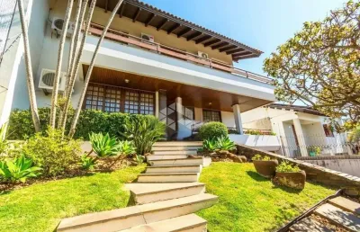 Casa com 4 quartos à venda na Rua Matias José Bins, 777, Três Figueiras, Porto Alegre