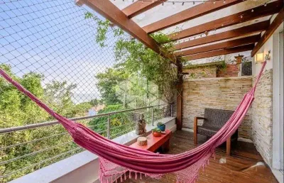 Casa com 4 quartos à venda na Rua Goitacaz, 333, Vila Assunção, Porto Alegre