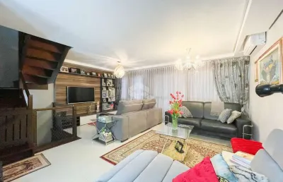 Casa com 3 dormitórios, sendo 2 suítes, uma delas com closet,  no bairro pedra redonda, zona sul de porto alegre