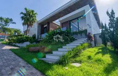 Casa moderna com piscina e 3 suítes no alphaville porto alegre
