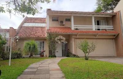 Casa com 4 quartos à venda na Travessa Pedra Redonda, 130, Jardim Isabel, Porto Alegre