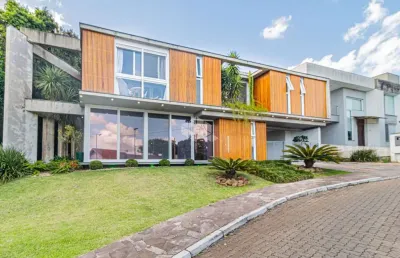 Concreto aparente e ripados, mobiliada, 3 suítes e 4 vagas