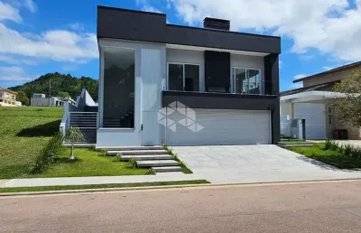 Casa 4 suítes em condomínio lombardia no alphaville em porto alegre