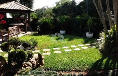 Casa com 4 quartos à venda na Rua Rodonel Guatimozim, 55, Ipanema, Porto Alegre