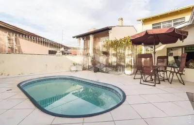 Casa 3 dormitórios 184 m2, suíte master, 4 banheiros, piscina a 100 metros zaffari cavalhada