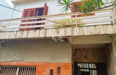 Casa antiga na rua carlos trein filho no bairro auxiliadora em porto alegre para reformar e vender