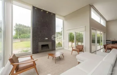 Casa em condomínio com 249m² e 3 dormitórios, 3 suítes, 4 vagas no bairro alphaville em porto alegre para comprar