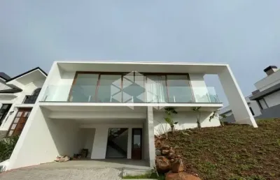 Casa 03 dormitórios em condomínio, de frente para o lago!