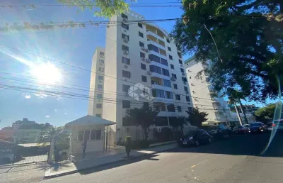 Apartamento térreo 02 dormitórios (1 suíte) no centro