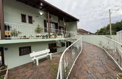 Casa em terreno comercial no bairro ana nery/arroio grande