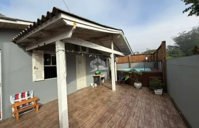 Casa de esquina, 03 dormitórios e piscina no bairro aliança