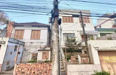 Terreno com casa e 02 apartamentos a venda no bairro centro