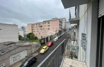 Apartamento amplo de 2 dormitórios no centro de santa maria - próximo à prefeitura