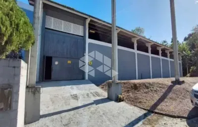 Pavilhão no bairro potecas, em são josé, sc, medindo 1,100m² de área total.