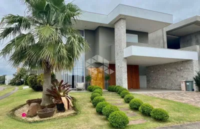 Casa em condomínio fechado com 4 quartos à venda na Avenida Beira Mar, 1200, Zona Rural, Capão da Canoa