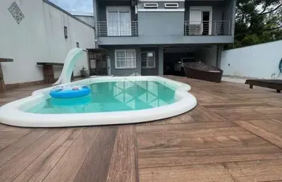 Casa com 4 quartos à venda na Avenida Nonoai, 724, Nonoai, Porto Alegre