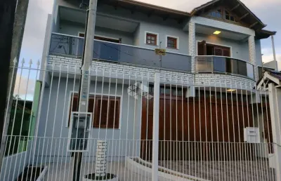 Casa com 3 quartos à venda na Rua Oscar Ferreira, 250, Rubem Berta, Porto Alegre