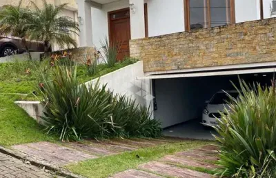 Casa em condomínio fechado com 3 quartos à venda na Avenida Senador Salgado Filho, 8500, Jardim Krahe, Viamão