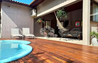Casa em condomínio fechado com 3 quartos à venda na estrada capitão gentil machado de godoy, 4500, vila elsa, viamão, 340 m2 por r$ 980.000