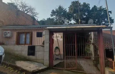 Casa com 3 quartos à venda na Rua Goiás, 15, Lomba do Pinheiro, Porto Alegre