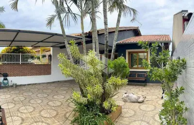 Casa com 4 quartos à venda na Avenida Elmira Pereira Silveira, 1270, Jardim Algarve, Alvorada