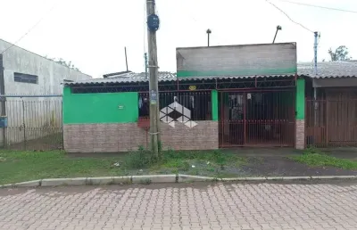 Casa de 02 dormitórios no bairro tijuca em alvorada.