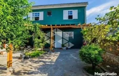 Casa com 4 quartos à venda na Rua Três Mil Setecentos E Setenta E Dois, 542, Lomba do Pinheiro, Porto Alegre