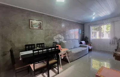 Casa térrra com 2 quartos, sala ampla, espaço gourmet com 2 vagas