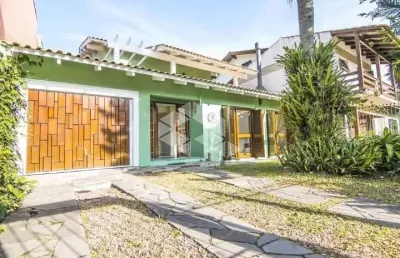 Casa com 6 quartos à venda na Rua Doutor Benjamin Camozato, 55, Jardim Isabel, Porto Alegre