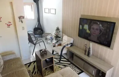 Sobrado com 2 dormitório, sala e banheiro , cozinha  com churrasqueira e garagem no bairro desvio ri